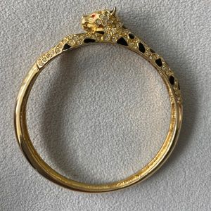 80s gold tone and rhinestone leopard/panther bangle with black enamel spots